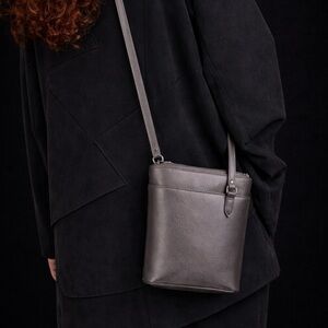 Derek Alexander genuine leather Handbag crossbody with a soft satin finish.